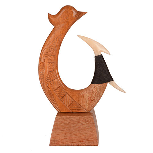Carved wooden fish hook on stand. WA023