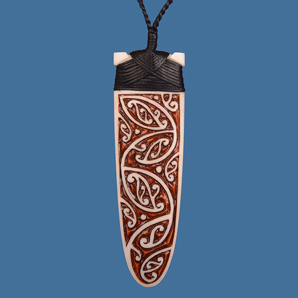 Intricately Carved Bone Bound Toki Pendant with brown stain - BT014