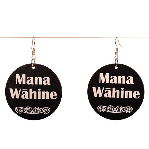 Black round earrings with 'Mana Wáhine' text on a white background