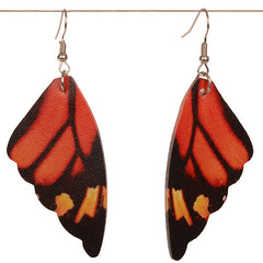 Butterfly wing-shaped earrings on a white background