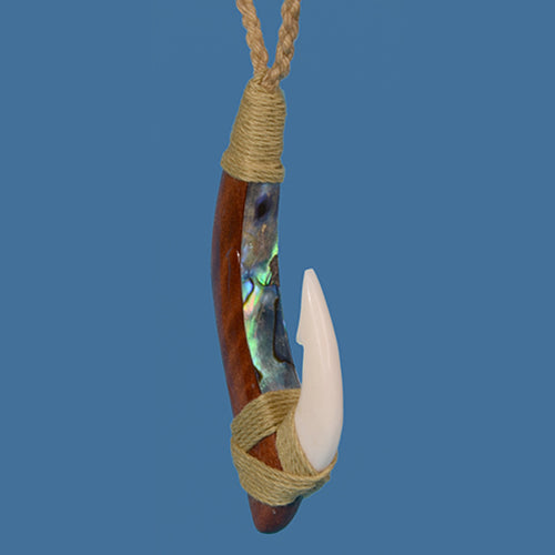 Wooden hook pendant with a rope on a blue background