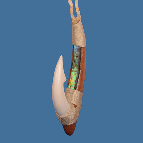 Wooden hook pendant with a rope on a blue background