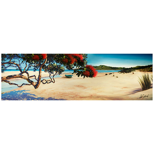 Panoramic view of a beach with a tree and red flowers, and clear blue sky.