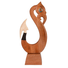 Wooden Manaia carving on stand. WA022