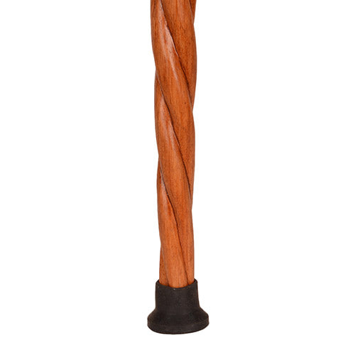 Wooden decorative stick with a carved top on a white background