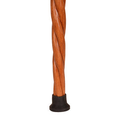 Wooden decorative stick with a carved top on a white background