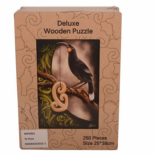 Box of a deluxe wooden puzzle with a bird design on the cover