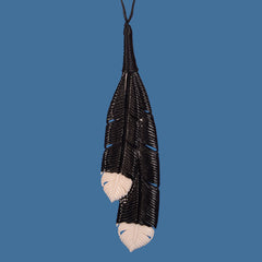 Carved bone Huia feather pendant. BP018