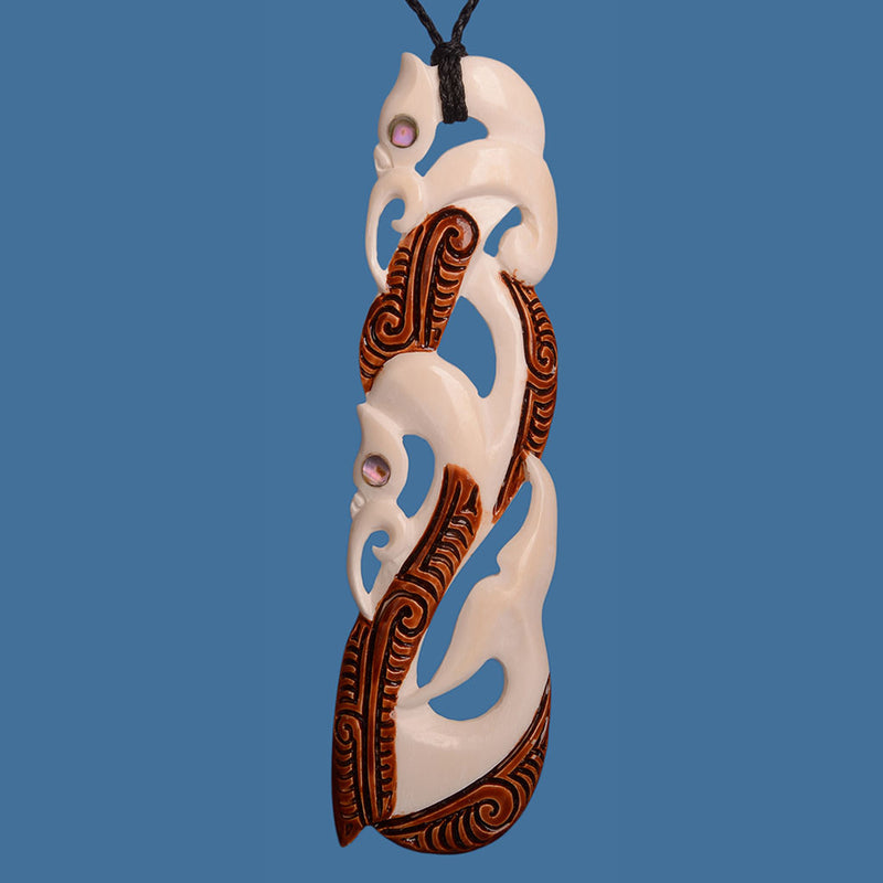 Beautiful Extra Large Bone Double Manaia Pendant on an adjustable braided cord. BPXL011