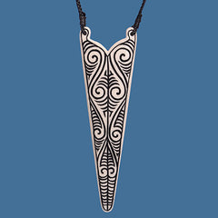 Bone pendant with black koru markings FBC088